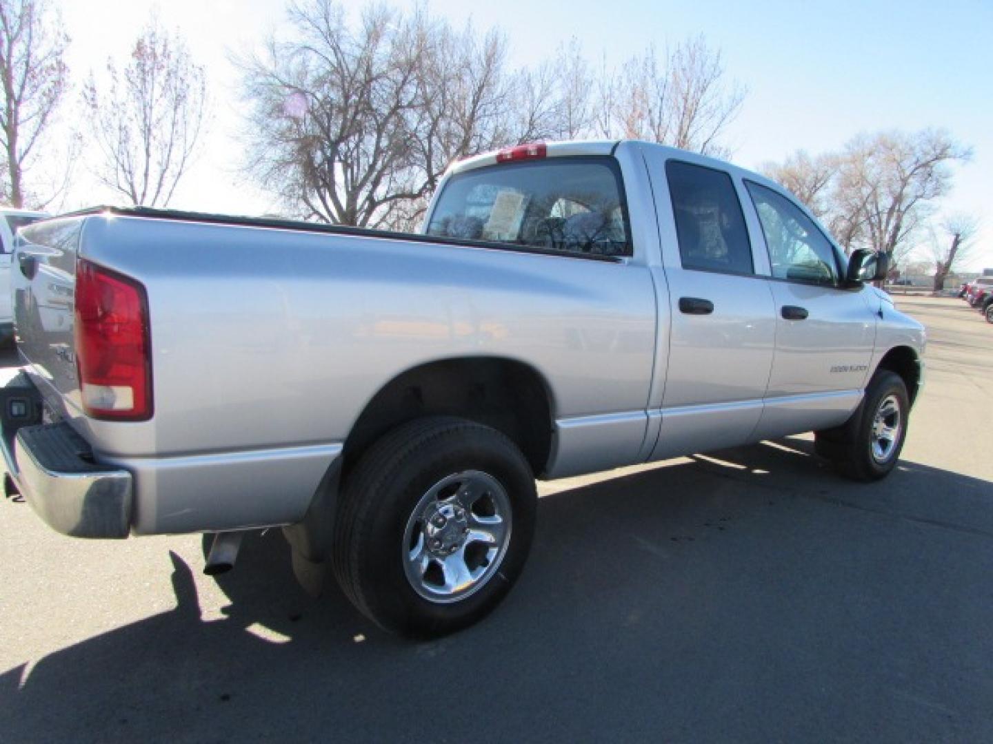 2005 Silver /Gray Dodge Ram 1500 SLT (1D7HU18D15S) with an 5.7 Hemi V8 engine engine, 5 speed automatic transmission, located at 4562 State Avenue, Billings, MT, 59101, (406) 896-9833, 45.769516, -108.526772 - 2005 Dodge Ram 1500 SLT Quad Cab Short Bed 4WD 5.7L V8 OHV 16V Hemi Engine - 5 speed automatic transmission - 4 wheel drive - 159,014 miles SLT package - air conditioning - tilt wheel - cruise control - AM/FM/CD audio - power windows and door locks - power drivers seat - privacy glass - keyles - Photo#4